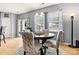 Cozy breakfast nook with windows overlooking the backyard is perfect for enjoying casual meals at 575 Marthas View Nw Dr, Huntersville, NC 28078