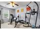 Home gym with exercise equipment, motivational wall art, and ample space for workouts at 575 Marthas View Nw Dr, Huntersville, NC 28078