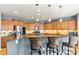 Beautiful kitchen with wood cabinets, stainless steel appliances, a granite countertop, and bar stool seating at 575 Marthas View Nw Dr, Huntersville, NC 28078