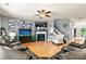 Bright living room featuring hardwood floors, a fireplace, and stylish decor, creating a cozy ambiance at 575 Marthas View Nw Dr, Huntersville, NC 28078