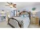 Relaxing main bedroom showcasing a luxurious bed, soft lighting, and an en-suite bathroom at 575 Marthas View Nw Dr, Huntersville, NC 28078