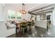 Cozy dining nook featuring bench seating and an open view into the well-equipped kitchen at 5868 Savona Ter, Fort Mill, SC 29708