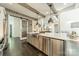 Open kitchen featuring an island with seating, stainless appliances, and modern design at 5868 Savona Ter, Fort Mill, SC 29708