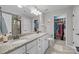 Elegant bathroom with granite double vanity, walk-in shower, and spacious closets for abundant storage at 5908 Glassport Ln, Charlotte, NC 28210
