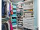 Organized walk-in closet featuring custom shelving, drawers, and ample storage for clothes and accessories at 5908 Glassport Ln, Charlotte, NC 28210