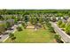Aerial view of the community playground, surrounded by lush greenery and neighborhood homes at 5908 Glassport Ln, Charlotte, NC 28210