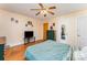 Spacious bedroom featuring hardwood floors and a built-in mirror at 627 Gray Dr, Charlotte, NC 28213