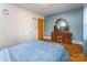 Bedroom featuring hardwood floors and a classic wood dresser at 627 Gray Dr, Charlotte, NC 28213