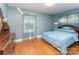 Serene bedroom with hardwood floors and a large window for natural light at 627 Gray Dr, Charlotte, NC 28213