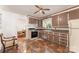 Traditional kitchen featuring classic appliances, ample counter space and a connected dining area at 627 Gray Dr, Charlotte, NC 28213