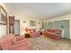Comfortable living room featuring classic furnishings and ample seating at 627 Gray Dr, Charlotte, NC 28213