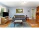 Comfortable living room featuring hardwood floors and natural light at 627 Gray Dr, Charlotte, NC 28213