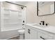 Bathroom featuring a large, white shower and updated vanity with matte black fixtures at 6525 Kershaw Camden Hwy, Heath Springs, SC 29058