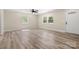 Inviting living room with stylish flooring, bright windows, and a neutral color palette at 6525 Kershaw Camden Hwy, Heath Springs, SC 29058