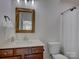 Updated bathroom with new vanity, mirror, and lighting at 712 Chase Ct, Fort Mill, SC 29708
