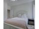 Cozy bedroom with a comfortable bed, neutral color scheme, bedside table, and soft natural light at 712 Chase Ct, Fort Mill, SC 29708