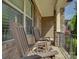 Relaxing front porch with rocking chairs, showcasing a cozy outdoor seating area at 712 Chase Ct, Fort Mill, SC 29708