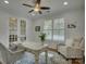 Bright office with plantation shutters, French doors, and a comfortable seating area, ideal for remote work at 712 Chase Ct, Fort Mill, SC 29708