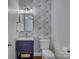 Stylish powder room with charming floral wallpaper, new fixtures, and vanity at 712 Chase Ct, Fort Mill, SC 29708