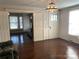 Hardwood floors and spacious entryway that enters into the living room at 8350 Nc Hwy 90 E Hwy, Stony Point, NC 28678