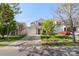 A well-kept two-story home with a driveway, lawn, and an inviting front entrance at 8917 Chalkstone Rd, Charlotte, NC 28216