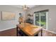 Open kitchen featuring a butcher block island, and a sliding glass door with access to the backyard at 8917 Chalkstone Rd, Charlotte, NC 28216