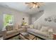 Comfortable living room with neutral tones, plush sofas, and stylish decor at 8917 Chalkstone Rd, Charlotte, NC 28216