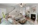 Spacious living room featuring hardwood floors, fireplace and comfortable seating at 8917 Chalkstone Rd, Charlotte, NC 28216