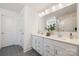 Bright bathroom featuring a double vanity with a white countertop and stylish geometric tile flooring at 9913 Jack Nicklaus Dr # 908, Lancaster, SC 29720