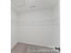 Spacious walk-in closet featuring ample shelving and carpeting at 9913 Jack Nicklaus Dr # 908, Lancaster, SC 29720