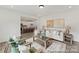 Inviting living room adjacent to the kitchen, perfect for entertaining guests at 9913 Jack Nicklaus Dr # 908, Lancaster, SC 29720