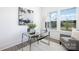 Bright office space with a glass desk, a comfortable chair, and natural light at 9913 Jack Nicklaus Dr # 908, Lancaster, SC 29720