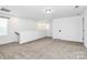 Spacious bonus room with carpet flooring at 10031 Travis Floyd Ln, Charlotte, NC 28214