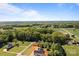 Expansive aerial view of land with a water tower in the distance at 101 Blueberry Hill Dr, Statesville, NC 28625