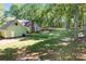 Spacious backyard with mature trees and patio, perfect for outdoor activities and entertaining at 101 Blueberry Hill Dr, Statesville, NC 28625