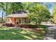 Charming home featuring beautiful landscaping and a welcoming front porch at 101 Blueberry Hill Dr, Statesville, NC 28625