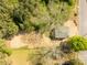 Overhead shot of a house on a lot surrounded by trees at 119 Washington St, York, SC 29745