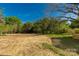Large backyard featuring a green lawn, bare ground and newly constructed stairs at 119 Washington St, York, SC 29745