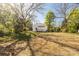 House with a sprawling backyard, bare ground and new deck at 119 Washington St, York, SC 29745