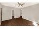 Cozy bedroom features wood-look floors, neutral walls, and open doorway at 119 Washington St, York, SC 29745