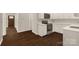 Kitchen features an oven, white cabinetry and countertops and durable flooring at 119 Washington St, York, SC 29745