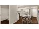 Charming kitchen with a dining table and an adjacent bathroom with a shower and tub at 119 Washington St, York, SC 29745