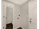 Bright laundry room with hookups and door to half bathroom at 119 Washington St, York, SC 29745
