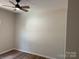 Bedroom featuring ceiling fan, hardwood floors, neutral paint at 122 39Th Avenue Nw Ct, Hickory, NC 28601