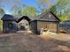 Charming exterior of a modern home with a dark color at 122 39Th Avenue Nw Ct, Hickory, NC 28601