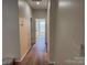 Hallway featuring hardwood floors and lots of natural light at 122 39Th Avenue Nw Ct, Hickory, NC 28601