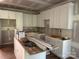 Bright kitchen features white cabinets and ample counter space awaiting finishing touches at 122 39Th Avenue Nw Ct, Hickory, NC 28601