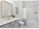 Beautiful bathroom with a modern vanity, decorative mirror, and shower-tub combination at 13097 Arnold Palmer Cir # 844, Lancaster, SC 29720