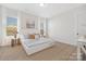 Serene bedroom featuring a large bed, soft lighting, and minimalist decor at 13097 Arnold Palmer Cir # 844, Lancaster, SC 29720