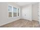 Inviting bedroom filled with natural light, showcasing a window and closet at 13097 Arnold Palmer Cir # 844, Lancaster, SC 29720